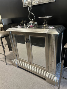 41.5" L x 14.5" W x 35" H 2 Door Mirrored Console Chest By: Carolyn Kinder International