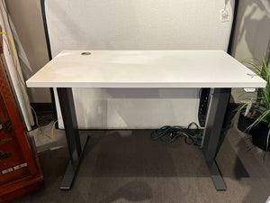 46"L x 28"H x 23"D Adjustable Height Desk