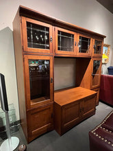 Load image into Gallery viewer, 86"L x 79"H x 28"D BASSETT Mission Style Entertainment Center
