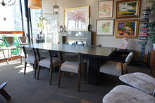 Load image into Gallery viewer, 110"L x 47.5"W x 30"H Custom Ebony on Ash Finish Dining Tabbl ew/ 1 20" Leaf &amp; 10 Chairs from Four Hands
